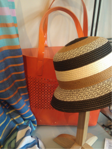Orange bag WAS £40, NOW £20,  Hat WAS £27, NOW £22, Scarf WAS £29, NOW £15.
